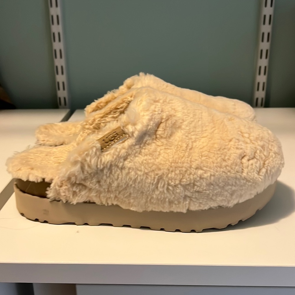 Women’s Ugg Fuzzy Slipper.  Size 9.  Worn once indoors.  Does not come with box.